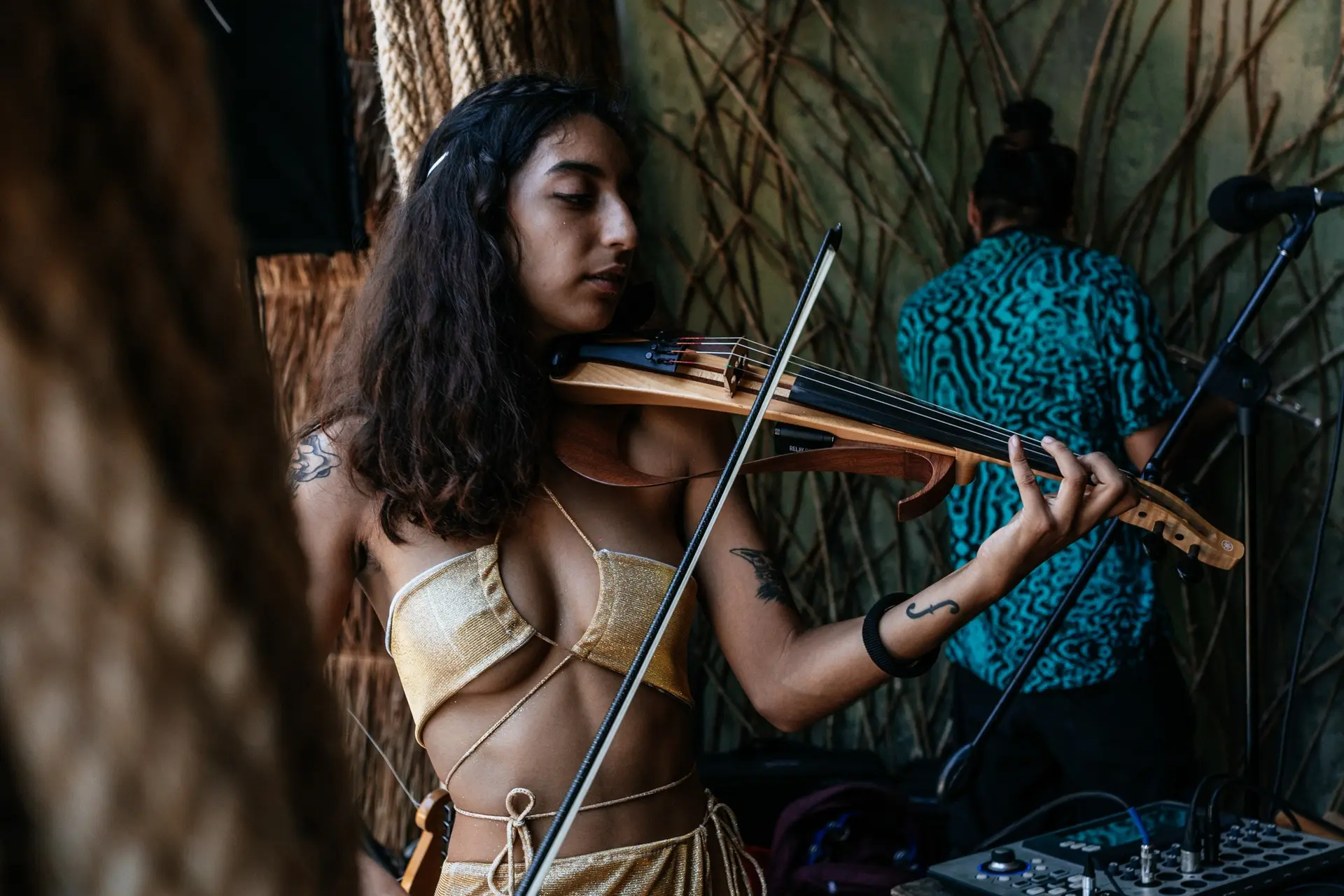 Violinist performing live at the festival