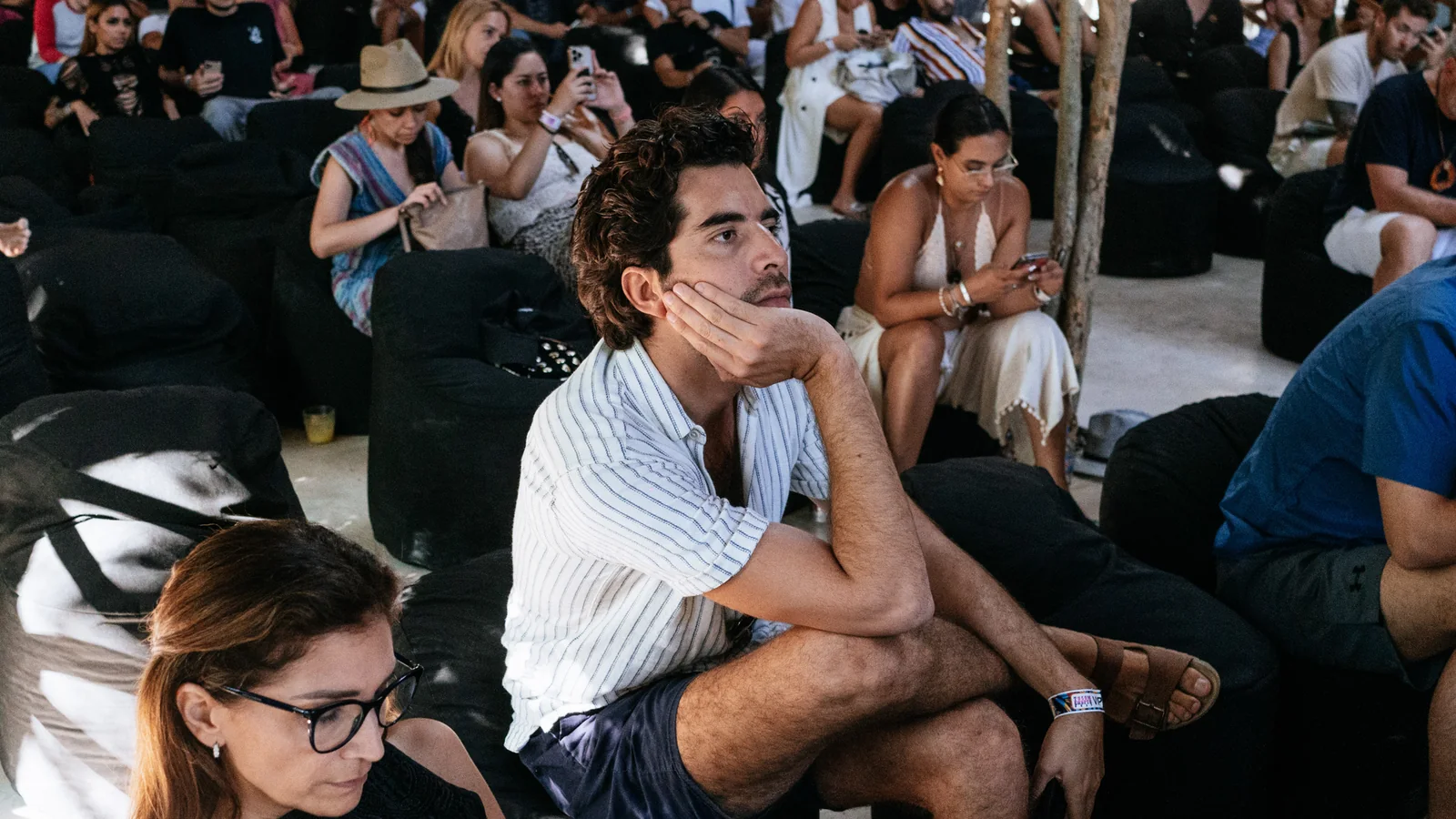 Audience seated during a talk at a previous TIF edition